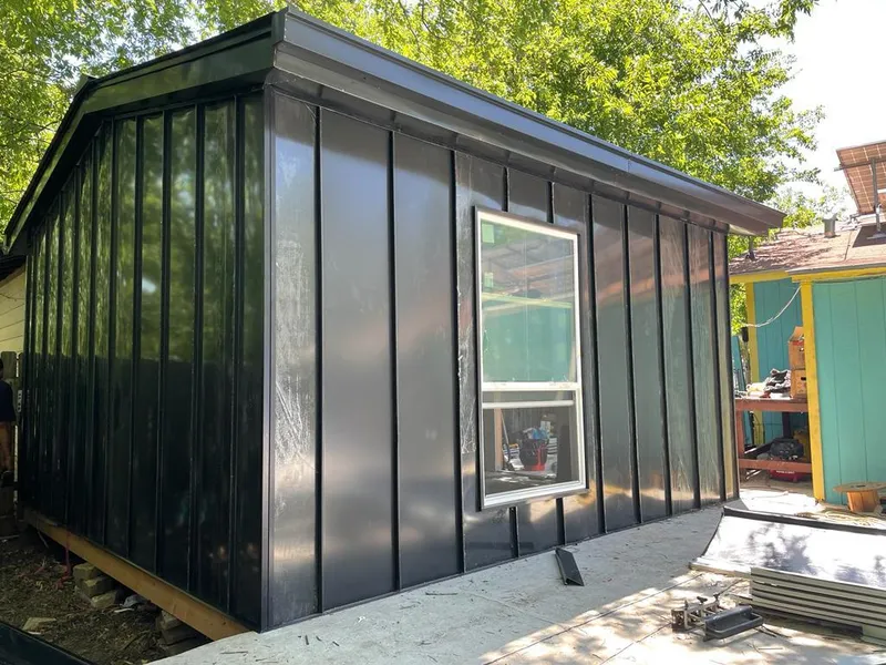 Black standing seam metal wall panels for Metal Roof Installation in Anna