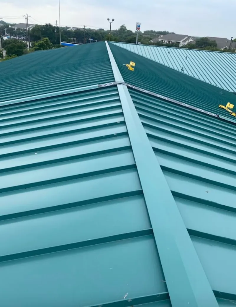 Green commercial metal roof ridge and valley for Metal Roof Repair in Anna